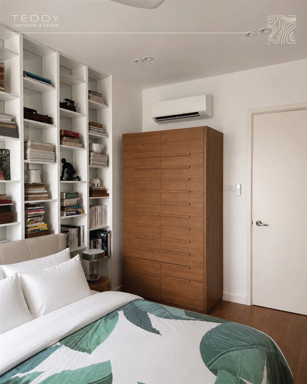 Bedroom with built-in bookshelf and wood wardrobe