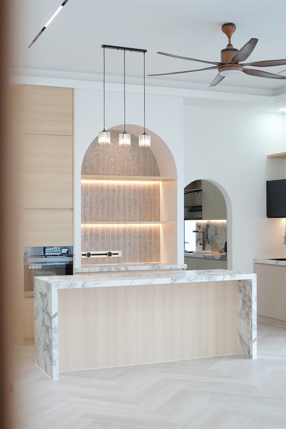 Custom kitchen island and arched display cabinet by Teddy Carpentry at Horizon Hills, Iskandar Puteri, Johor
